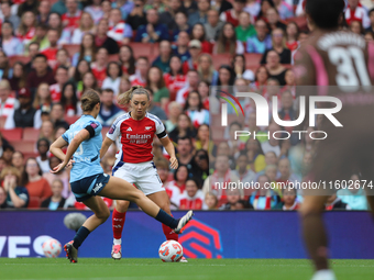 Katie McCabe and Kerstin Casparij during the Barclays FA Women's Super League match between Arsenal and Manchester City at the Emirates Stad...