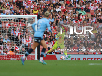 Goalkeeper Manuela Zinsberger passes the ball during the Barclays FA Women's Super League match between Arsenal and Manchester City at the E...