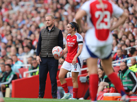 Jonas Eidevall is unhappy at the throw-in after being challenged by a Manchester City player during the Barclays FA Women's Super League mat...