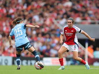 Mariona Caldentey challenges Yui Haegawa during the Barclays FA Women's Super League match between Arsenal and Manchester City at the Emirat...