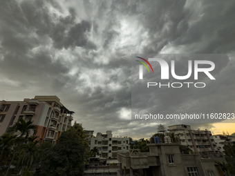 Monsoon clouds hover in the sky over residential buildings in Guwahati, India, on September 23, 2024. (