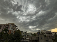 Monsoon clouds hover in the sky over residential buildings in Guwahati, India, on September 23, 2024. (