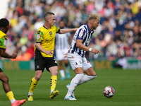 Uros Racic of West Bromwich Albion in action with Adam Forshaw of Plymouth Argyle during the Sky Bet Championship match between West Bromwic...