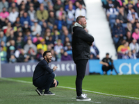 West Bromwich Albion's manager Carlos Corberan kneels during the Sky Bet Championship match between West Bromwich Albion and Plymouth Argyle...