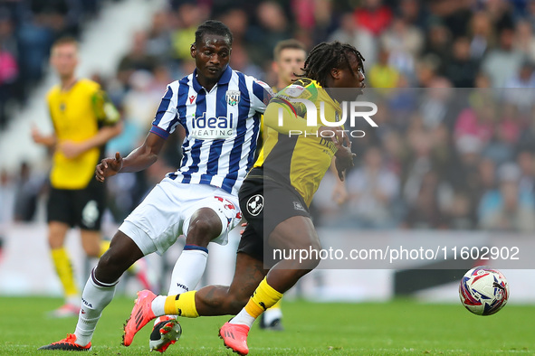 Michael Obafemi of Plymouth Argyle is in action with Ousmane Diakite of West Bromwich during the Sky Bet Championship match between West Bro...