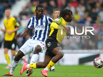 Michael Obafemi of Plymouth Argyle is in action with Ousmane Diakite of West Bromwich during the Sky Bet Championship match between West Bro...