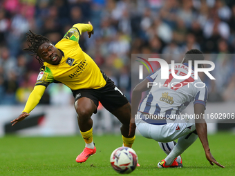 Michael Obafemi of Plymouth Argyle is in action with West Bromwich Albion's Ousmane Diakite during the Sky Bet Championship match between We...