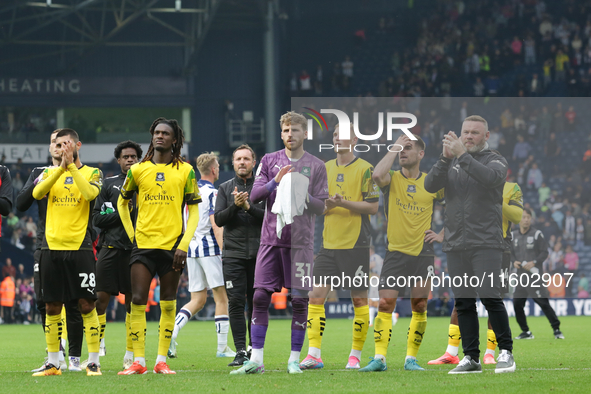 Plymouth Argyle's players and Wayne Rooney applaud their fans after the Sky Bet Championship match between West Bromwich Albion and Plymouth...