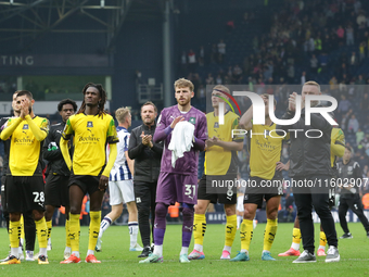 Plymouth Argyle's players and Wayne Rooney applaud their fans after the Sky Bet Championship match between West Bromwich Albion and Plymouth...