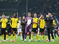 Plymouth Argyle's players and Wayne Rooney applaud their fans after the Sky Bet Championship match between West Bromwich Albion and Plymouth...