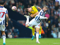 Joe Edwards of Plymouth Argyle challenges for a header with Mikey Johnston of West Bromwich Albion during the Sky Bet Championship match bet...