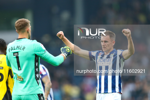 Jed Wallace of West Bromwich Albion celebrates with Alex Palmer after the Sky Bet Championship match between West Bromwich Albion and Plymou...