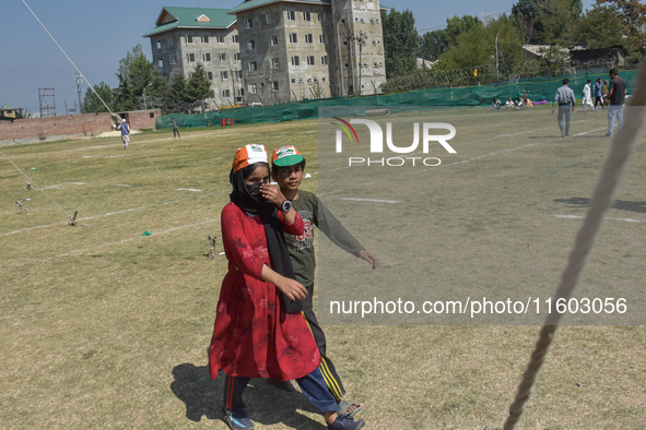 Supporters of the Indian National Congress arrive at the venue during a rally held by Rahul Gandhi in Srinagar, Indian Administered Kashmir,...