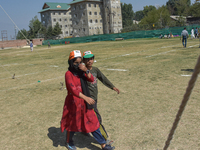 Supporters of the Indian National Congress arrive at the venue during a rally held by Rahul Gandhi in Srinagar, Indian Administered Kashmir,...