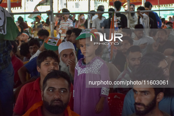 Supporters of the Indian National Congress attend a campaign rally held by Rahul Gandhi in Srinagar, Indian Administered Kashmir, on Septemb...