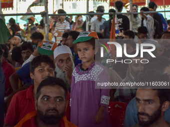 Supporters of the Indian National Congress attend a campaign rally held by Rahul Gandhi in Srinagar, Indian Administered Kashmir, on Septemb...