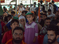 Supporters of the Indian National Congress attend a campaign rally held by Rahul Gandhi in Srinagar, Indian Administered Kashmir, on Septemb...