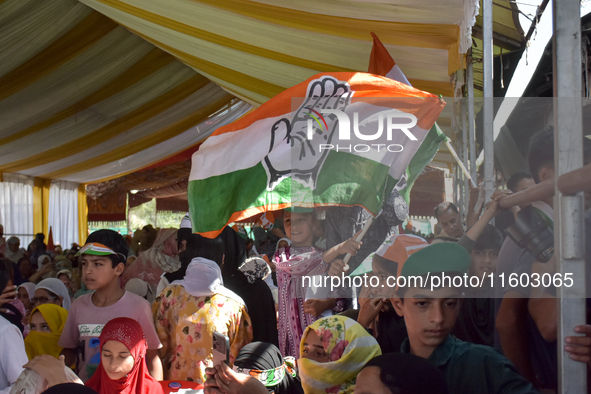 Supporters of the Indian National Congress attend a campaign rally held by Rahul Gandhi in Srinagar, Indian Administered Kashmir, on Septemb...