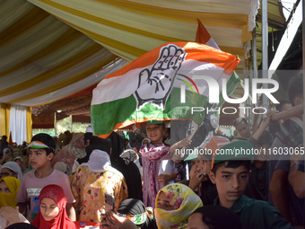 Supporters of the Indian National Congress attend a campaign rally held by Rahul Gandhi in Srinagar, Indian Administered Kashmir, on Septemb...