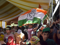 Supporters of the Indian National Congress attend a campaign rally held by Rahul Gandhi in Srinagar, Indian Administered Kashmir, on Septemb...