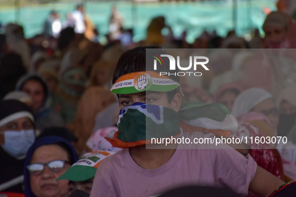 Supporters of the Indian National Congress attend a campaign rally held by Rahul Gandhi in Srinagar, Indian Administered Kashmir, on Septemb...