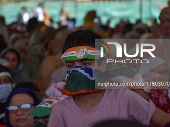 Supporters of the Indian National Congress attend a campaign rally held by Rahul Gandhi in Srinagar, Indian Administered Kashmir, on Septemb...