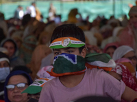 Supporters of the Indian National Congress attend a campaign rally held by Rahul Gandhi in Srinagar, Indian Administered Kashmir, on Septemb...