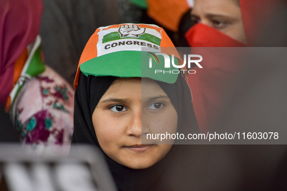 Supporters of the Indian National Congress attend a campaign rally held by Rahul Gandhi in Srinagar, Indian Administered Kashmir, on Septemb...