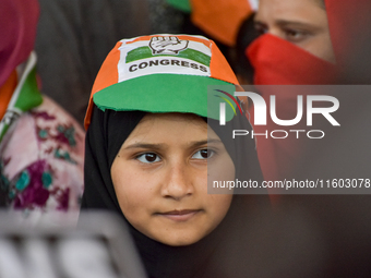 Supporters of the Indian National Congress attend a campaign rally held by Rahul Gandhi in Srinagar, Indian Administered Kashmir, on Septemb...