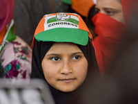 Supporters of the Indian National Congress attend a campaign rally held by Rahul Gandhi in Srinagar, Indian Administered Kashmir, on Septemb...