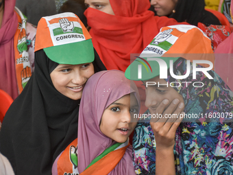 Supporters of the Indian National Congress attend a campaign rally held by Rahul Gandhi in Srinagar, Indian Administered Kashmir, on Septemb...