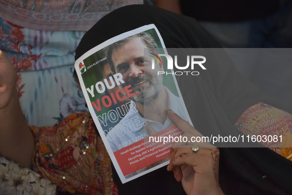 Supporters of the Indian National Congress attend a campaign rally held by Rahul Gandhi in Srinagar, Indian Administered Kashmir, on Septemb...