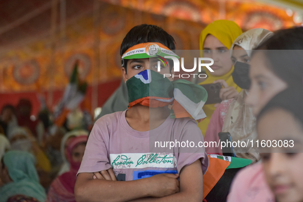 Supporters of the Indian National Congress attend a campaign rally held by Rahul Gandhi in Srinagar, Indian Administered Kashmir, on Septemb...