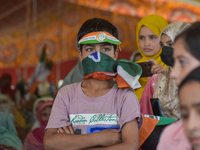 Supporters of the Indian National Congress attend a campaign rally held by Rahul Gandhi in Srinagar, Indian Administered Kashmir, on Septemb...