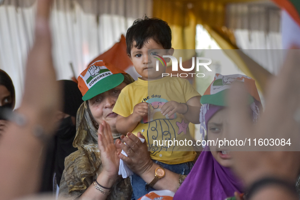 Supporters of the Indian National Congress attend a campaign rally held by Rahul Gandhi in Srinagar, Indian Administered Kashmir, on Septemb...