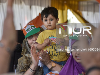 Supporters of the Indian National Congress attend a campaign rally held by Rahul Gandhi in Srinagar, Indian Administered Kashmir, on Septemb...