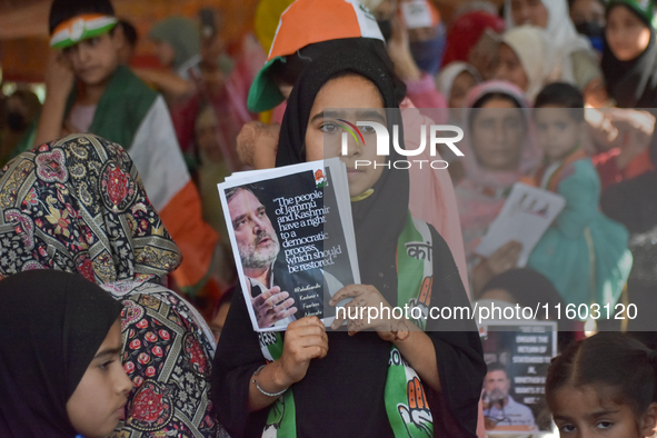 Supporters of the Indian National Congress attend a campaign rally held by Rahul Gandhi in Srinagar, Indian Administered Kashmir, on Septemb...