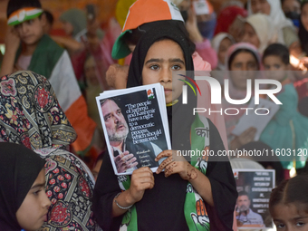 Supporters of the Indian National Congress attend a campaign rally held by Rahul Gandhi in Srinagar, Indian Administered Kashmir, on Septemb...