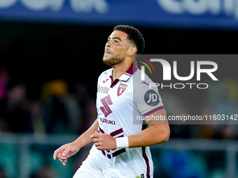 Che' Adams of Torino FC celebrates after scoring third goal during the Serie A Enilive match between Hellas Verona and Torino FC at Stadio M...