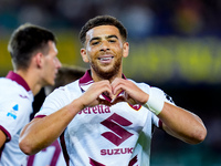 Che' Adams of Torino FC celebrates after scoring third goal during the Serie A Enilive match between Hellas Verona and Torino FC at Stadio M...