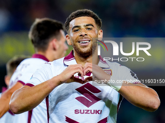 Che' Adams of Torino FC celebrates after scoring third goal during the Serie A Enilive match between Hellas Verona and Torino FC at Stadio M...