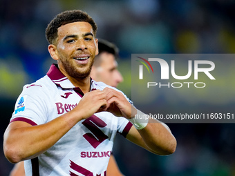 Che' Adams of Torino FC celebrates after scoring third goal during the Serie A Enilive match between Hellas Verona and Torino FC at Stadio M...