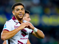 Che' Adams of Torino FC celebrates after scoring third goal during the Serie A Enilive match between Hellas Verona and Torino FC at Stadio M...