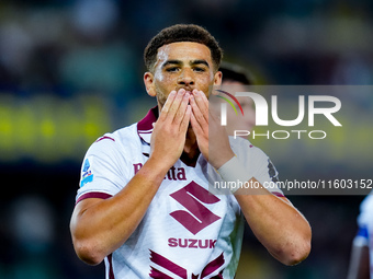 Che' Adams of Torino FC celebrates after scoring third goal during the Serie A Enilive match between Hellas Verona and Torino FC at Stadio M...