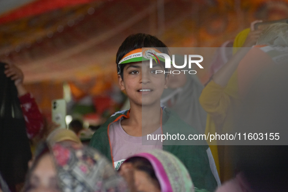 Supporters of the Indian National Congress attend a campaign rally held by Rahul Gandhi in Srinagar, Indian Administered Kashmir, on Septemb...