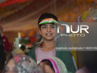 Supporters of the Indian National Congress attend a campaign rally held by Rahul Gandhi in Srinagar, Indian Administered Kashmir, on Septemb...