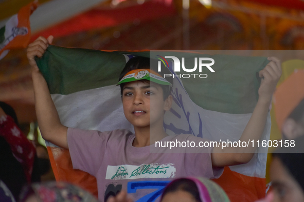 Supporters of the Indian National Congress attend a campaign rally held by Rahul Gandhi in Srinagar, Indian Administered Kashmir, on Septemb...