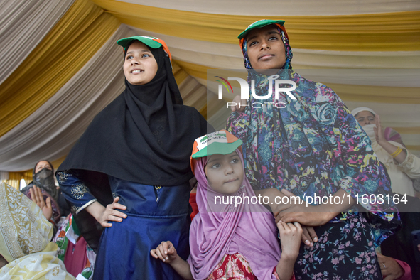 Supporters of the Indian National Congress attend a campaign rally held by Rahul Gandhi in Srinagar, Indian Administered Kashmir, on Septemb...