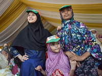 Supporters of the Indian National Congress attend a campaign rally held by Rahul Gandhi in Srinagar, Indian Administered Kashmir, on Septemb...