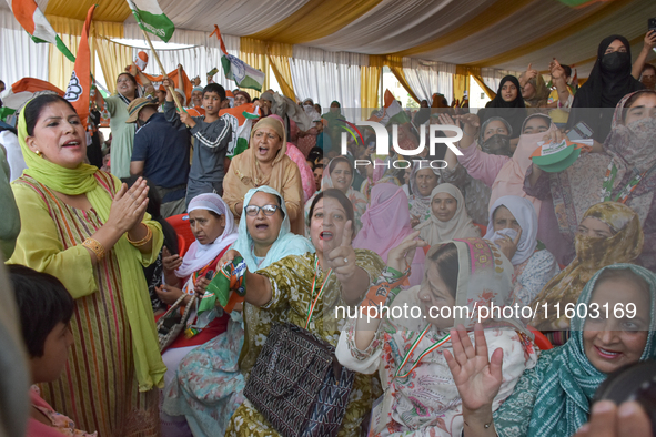 Supporters of the Indian National Congress attend a campaign rally held by Rahul Gandhi in Srinagar, Indian Administered Kashmir, on Septemb...